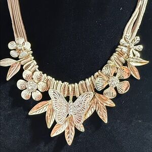 NWOT Elegant Floral and Butterfly Necklace in Gold and Silver